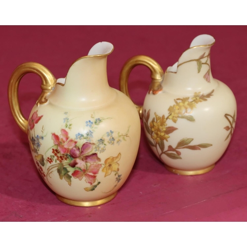 75 - A Royal Worcester Blush round bulbous shaped jug with multi-coloured floral, leaf and gilt decoratio... 