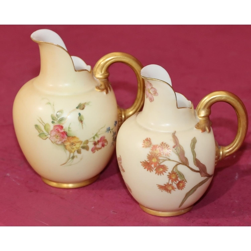 75 - A Royal Worcester Blush round bulbous shaped jug with multi-coloured floral, leaf and gilt decoratio... 