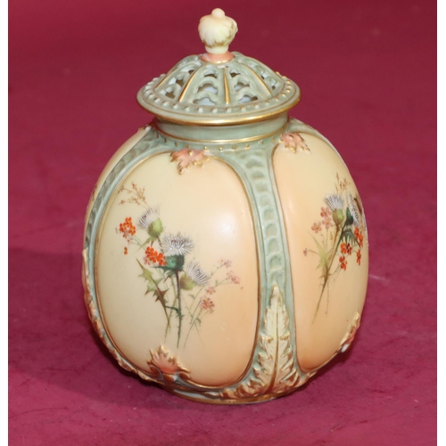 83 - A Royal Worcester Blush round bulbous thin necked lidded pot with multi-coloured thistle, leaf and g... 