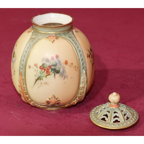 83 - A Royal Worcester Blush round bulbous thin necked lidded pot with multi-coloured thistle, leaf and g... 