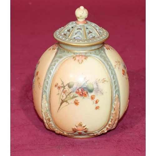 83 - A Royal Worcester Blush round bulbous thin necked lidded pot with multi-coloured thistle, leaf and g... 