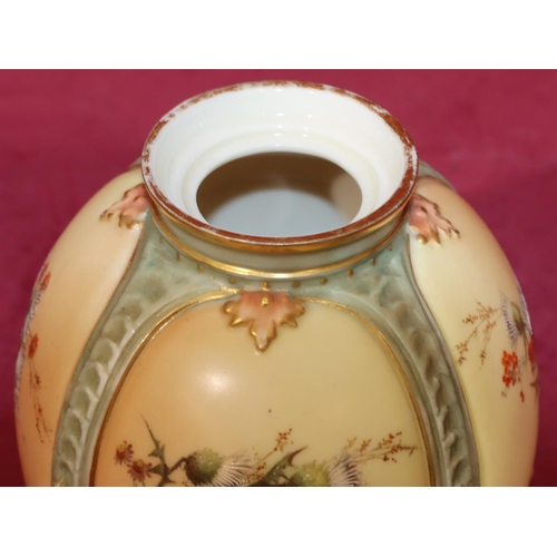 83 - A Royal Worcester Blush round bulbous thin necked lidded pot with multi-coloured thistle, leaf and g... 