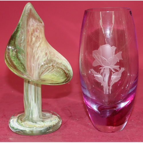 92 - A Caithness purple and clear glass round bulbous shaped vase with etched rose decoration, 20cm high ... 