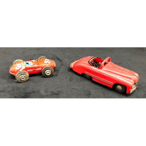 3305 - A Tri-Ang Mimic child's red plastic key wind car (no key), 17cm long and a red tin child's Indi 1000... 