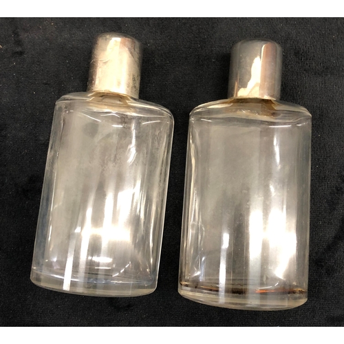 3316 - A leather cased double hip flask set with glass stoppers and silver coloured screw tops, case 13cm h... 