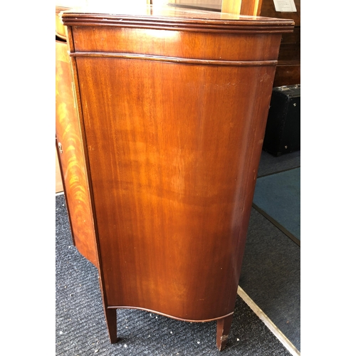 3322 - A mahogany serpentine fronted cupboard with 2 doors enclosing 1 shelf, 93cm wide, 35.5cm deep, 93.7c... 