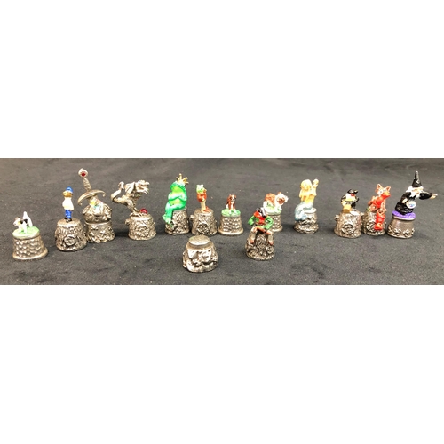 3330 - A quantity of various Warwick and other novelty thimbles, including Alice in Wonderland and small an... 