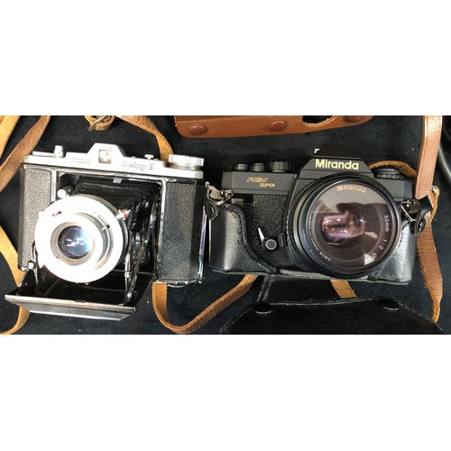 3338 - A Revere Stereo 33 Camera serial no. V- 13673 in brown leather case, a Welmy 6 camera, a Miranda MS-... 