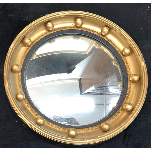 3345 - A large circular mirror in cream and gilt painted frame, 60cm diameter, a smaller circular mirror in... 