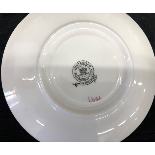 3366 - A Royal Staffordshire part service on white ground with gold coloured edging, 12 saucers, 8 cups, 1 ... 