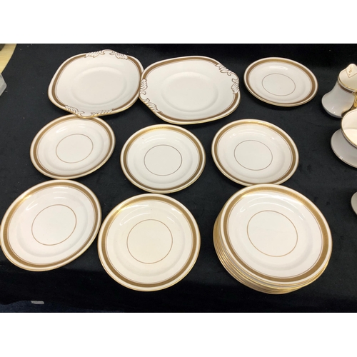 3366 - A Royal Staffordshire part service on white ground with gold coloured edging, 12 saucers, 8 cups, 1 ... 