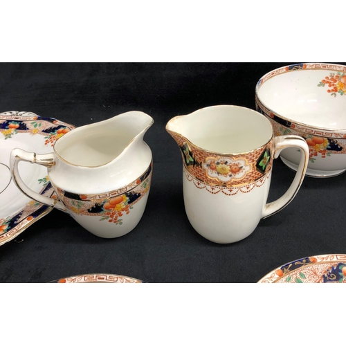 3370 - A Wetley China fruit patterned tea service, 11, small plates, 8, cups, 12 saucers, bowl, jug 2 cake ... 