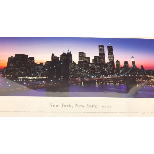 3386 - A coloured panoramic print of New York, in silver frame, 103.5cm x 36cm overall.