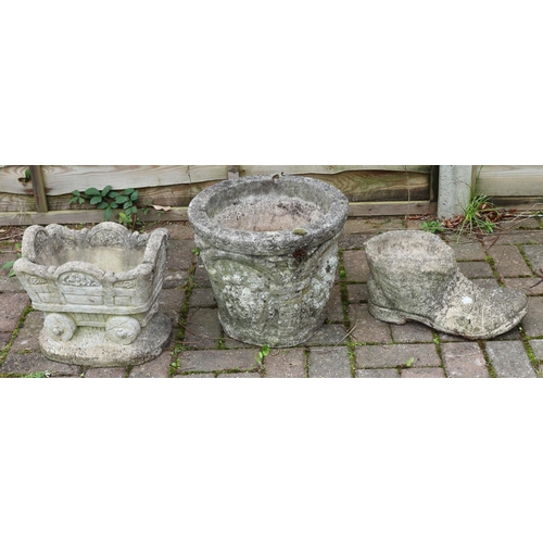 3412 - 3 garden pots consisting of a circular pot with raised figure decoration, 37cm diameter, 31cm high, ... 