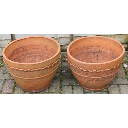 3413 - 2 modern terracotta round trumpet shaped garden pots with raised scallop shaped tops, 50cm diameter,... 