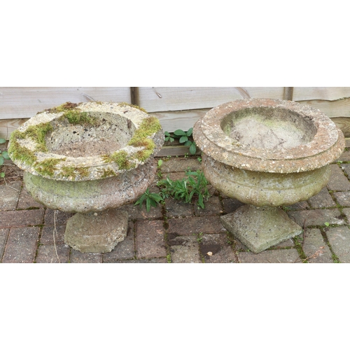 3415 - A pair of garden urns with bulbous bodies on square bases (1 base 2 corners a/f), 45cm diameter, 39c... 