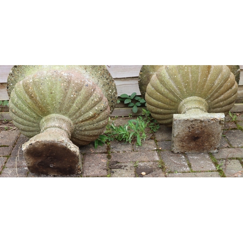 3415 - A pair of garden urns with bulbous bodies on square bases (1 base 2 corners a/f), 45cm diameter, 39c... 