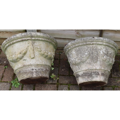 3416 - A pair of garden round trumpet shaped garden pots with raised swag and fruit sides, 50cm diameter, 3... 