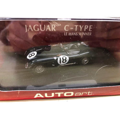 3430 - An Autoart scale model Jaguar C Type Lemans Winner 1953 65387, an Onyx Honda MP4/4,  a Watsons Water... 