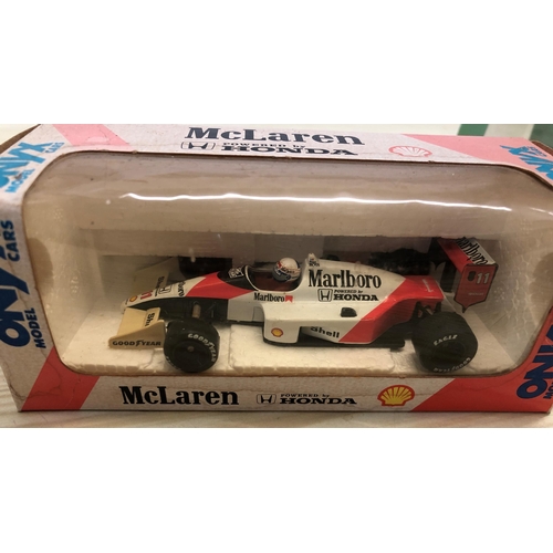 3430 - An Autoart scale model Jaguar C Type Lemans Winner 1953 65387, an Onyx Honda MP4/4,  a Watsons Water... 