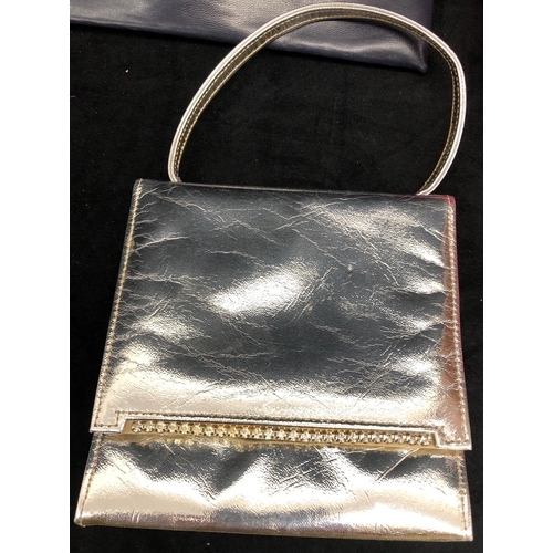 3254 - A silver coloured handbag and 4 other handbags. (5)