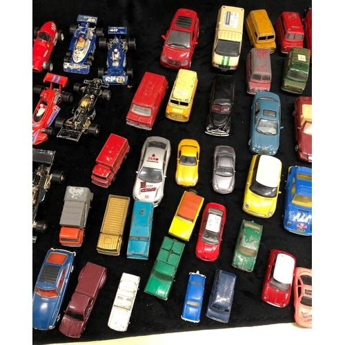 3284 - A quantity of various loose toy and model racing cars, vans, cars etc.