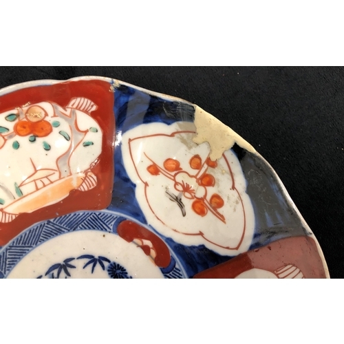 3311 - An Imari dish, 21cm diameter (a/f) and a Minton dish, 20cm diameter.