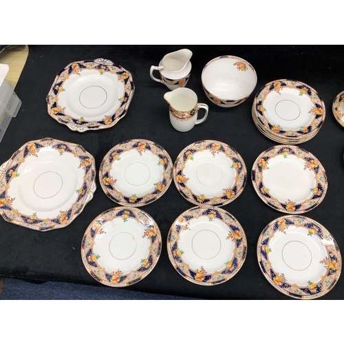 3370 - A Wetley China fruit patterned tea service, 11, small plates, 8, cups, 12 saucers, bowl, jug 2 cake ... 