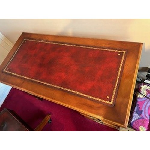 3561 - A reproduction computer desk with red leather inset top, slide out shelf below, 106cm wide, 75cm dee... 