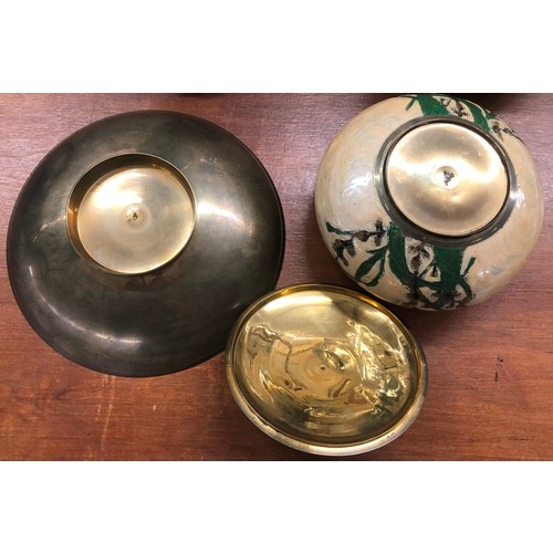 3553 - A painted brass dish and pot with lid on cream ground with bird and tree decoration, dish 23cm diame... 