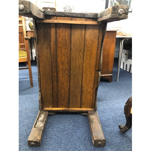 707 - An 18th Century small oak coffer with triple panelled carved front, on stile feet, hinged (inner bot... 