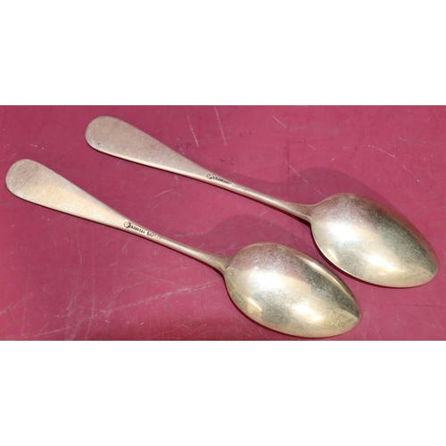 285 - A pair of Russian silver tablespoons with engraved monograms, both stamped to back CAZNKOBA?, 5.7oz