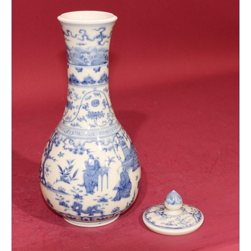 59 - An Oriental round bulbous thin necked trumpet shaped lidded vase on blue and white ground with figur... 