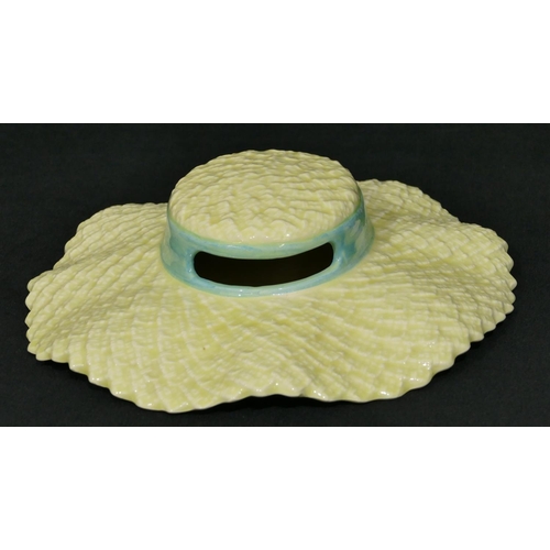 4249 - A Falcon Ware Art Deco style wall pocket in form of a hat, 26cm high, 22.5cm wide.