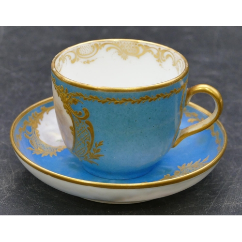 126 - A Meissen small porcelain cup and saucer on turquoise ground with hand painted cupid, floral and gil... 