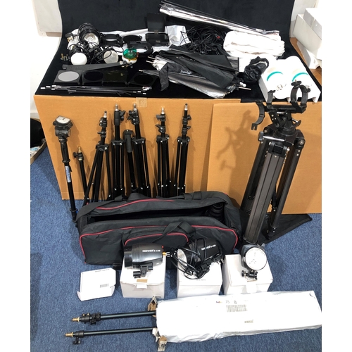 4033 - A quantity of camera equipment including tripods, bulbs, light filters, 3 x Neewer C-180 photo flash... 