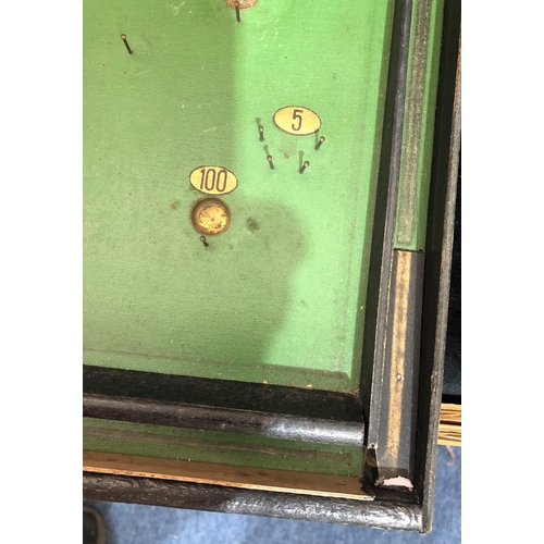 4044 - A Vintage Bagatelle board with 10 metal balls and wood dowel push, 39cm wide, 75.5cm long. (1 sectio... 