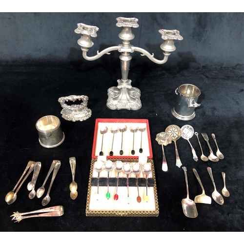 4047 - A plated 2 branch 3 light candlestick 25.5 cm high, 11 plated coffee bean spoons, boxed and a quanti... 