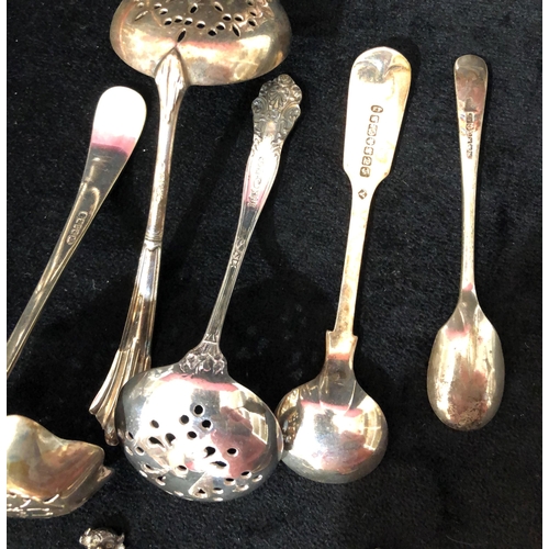 4047 - A plated 2 branch 3 light candlestick 25.5 cm high, 11 plated coffee bean spoons, boxed and a quanti... 