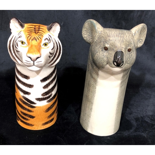 4054 - A koala's head jug 27cm high and a tiger's head jug 26.5cm high, both stamped Quail to base and both... 