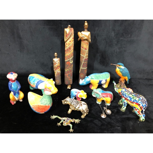 4055 - A collection of handmade South African animals with multi-coloured glaze, rhinoceros, 2 elephants, m... 