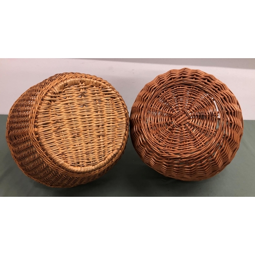 4064 - 2 wicker baskets, tallest 47cm high, 35cm diameter. (2)