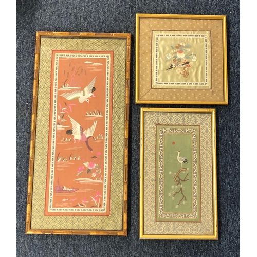 4074 - 3 Chinese silk embroidered panels depicting birds, flowers, trees etc, all framed, largest 30.5 x 63... 