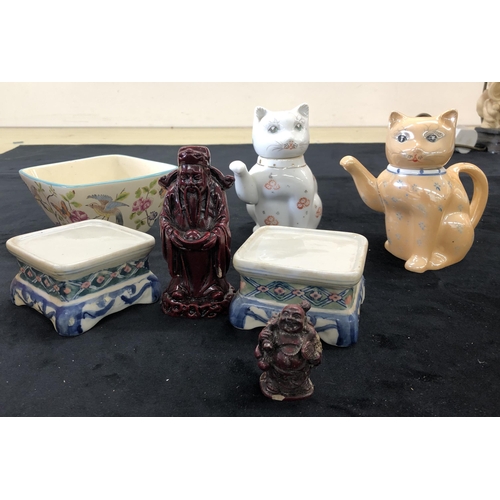 4091 - A pair of Chinese waving cats with detachable heads, 13cm high,  pair of Oriental stands, a bird and... 