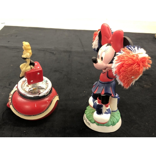 4094 - A nodding Minnie Mouse Cheerleader, 22.5cm high and a 