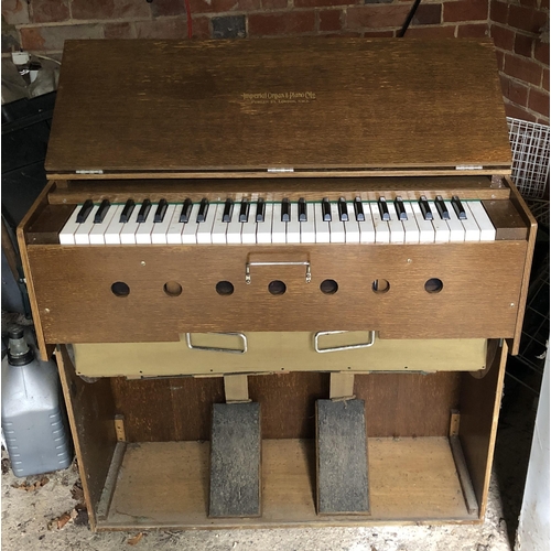 4096 - An Imperial Organ and Piano Company Limited portable folding pump organ, housed in wooden cased box ... 