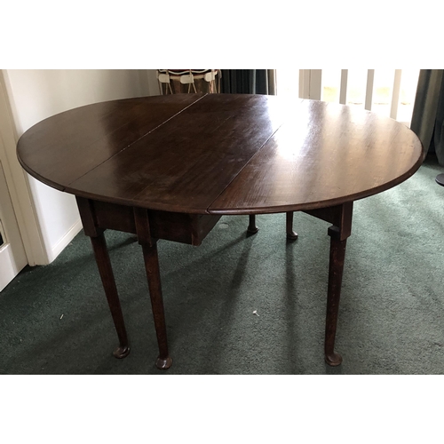 4101 - A good quality gateleg table with drop down leaves, oval top, 154.5cm wide, 1116cm wide (fully opene... 