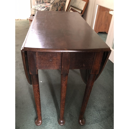 4101 - A good quality gateleg table with drop down leaves, oval top, 154.5cm wide, 1116cm wide (fully opene... 