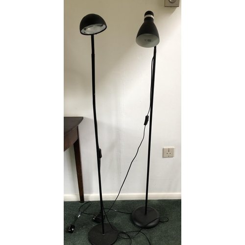 4105 - A pair of modern black floor lamps with adjustable shades, tallest approx. 139cm high, (both working... 