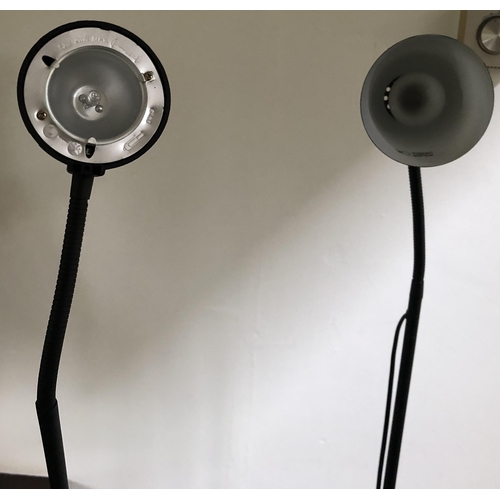 4105 - A pair of modern black floor lamps with adjustable shades, tallest approx. 139cm high, (both working... 